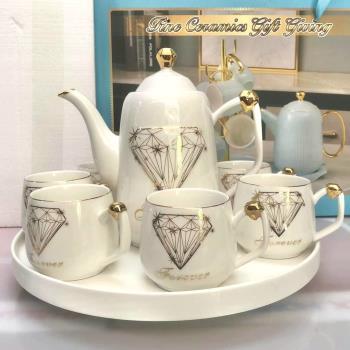 Bộ cố bình sứ khay tròn xoay kim cương